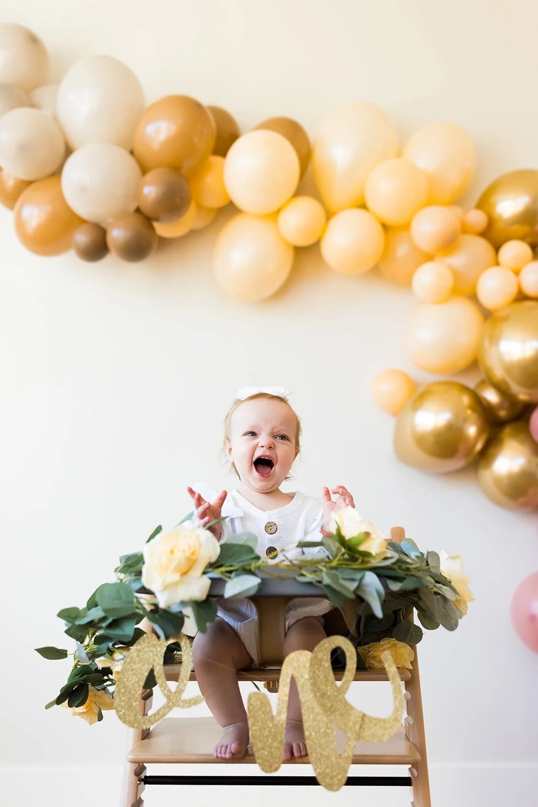 First birthday studio portrait, colorful and candid